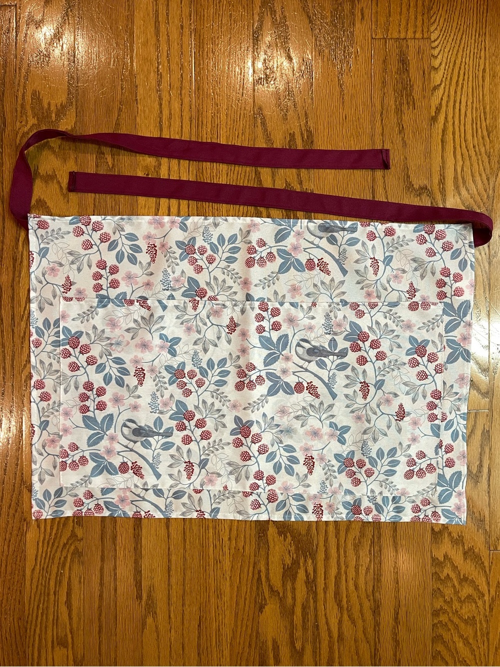 Apron with ribbon ties, one very large pocket, white gray blue burgundy